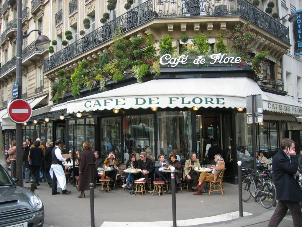 Historic café frontage with sidewalk seating at Café de Flore